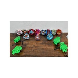 Beyblade Burst Evolution Turbo Lot 12 Spinning Tops 4 Launchers Valtryek Spryzen